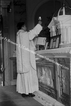 CHAN-REV.ALBERT-S.J. AT ALTAR EMO AFTER IST MASS